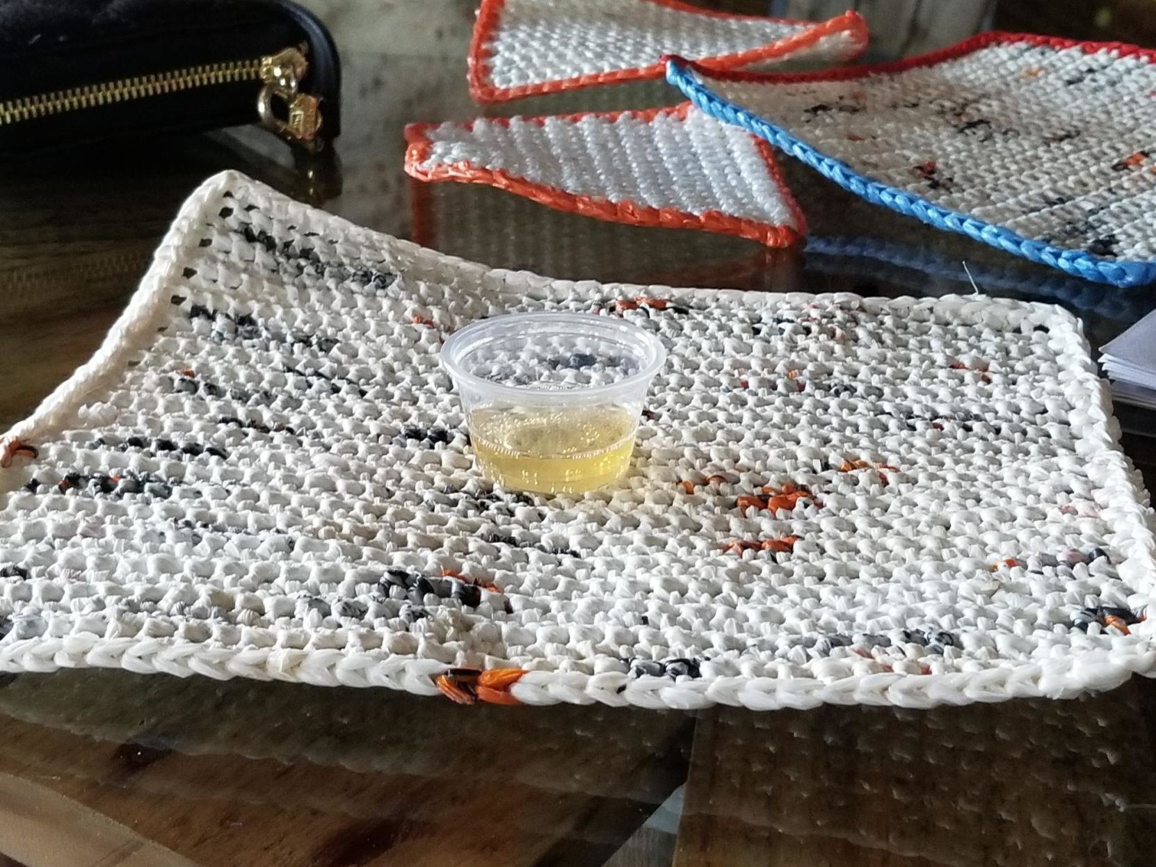 People - CV News - Coaster and purse